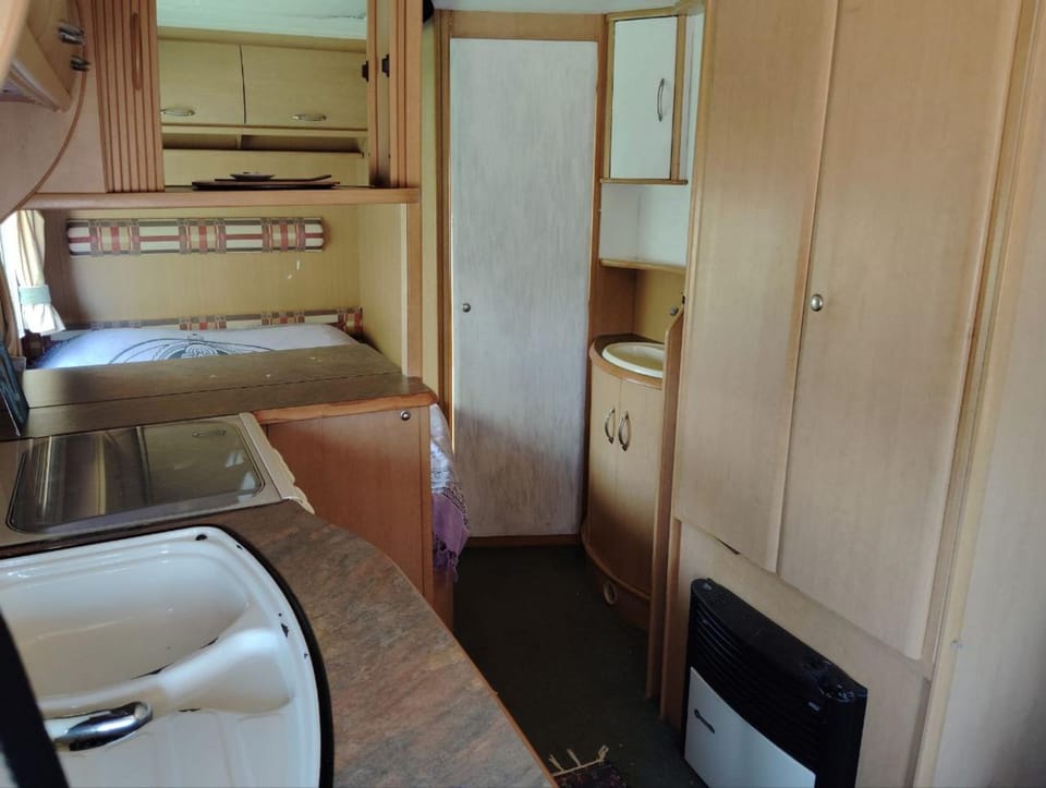 Uljanas caravana for 2 with view of the rescued horses House in Faro District