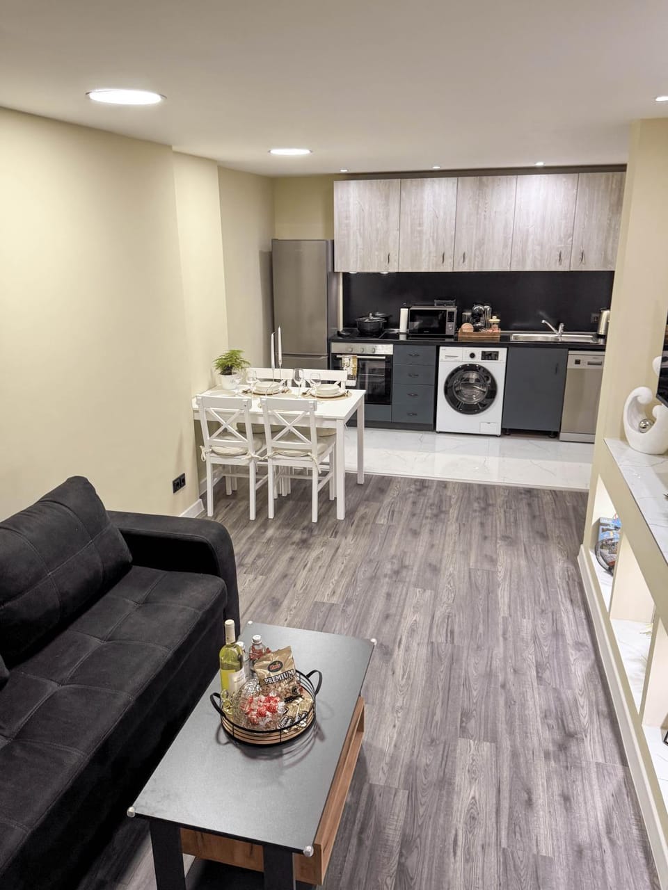 Kitchen or kitchenette, Living room, Seating area, Dining area, Dinner, dishwasher, oven, stove, washing machine, dryer, kitchen