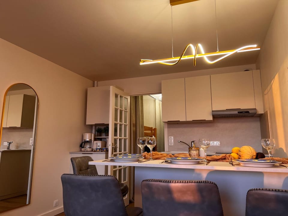 Kitchen or kitchenette, dishwasher, oven, stove