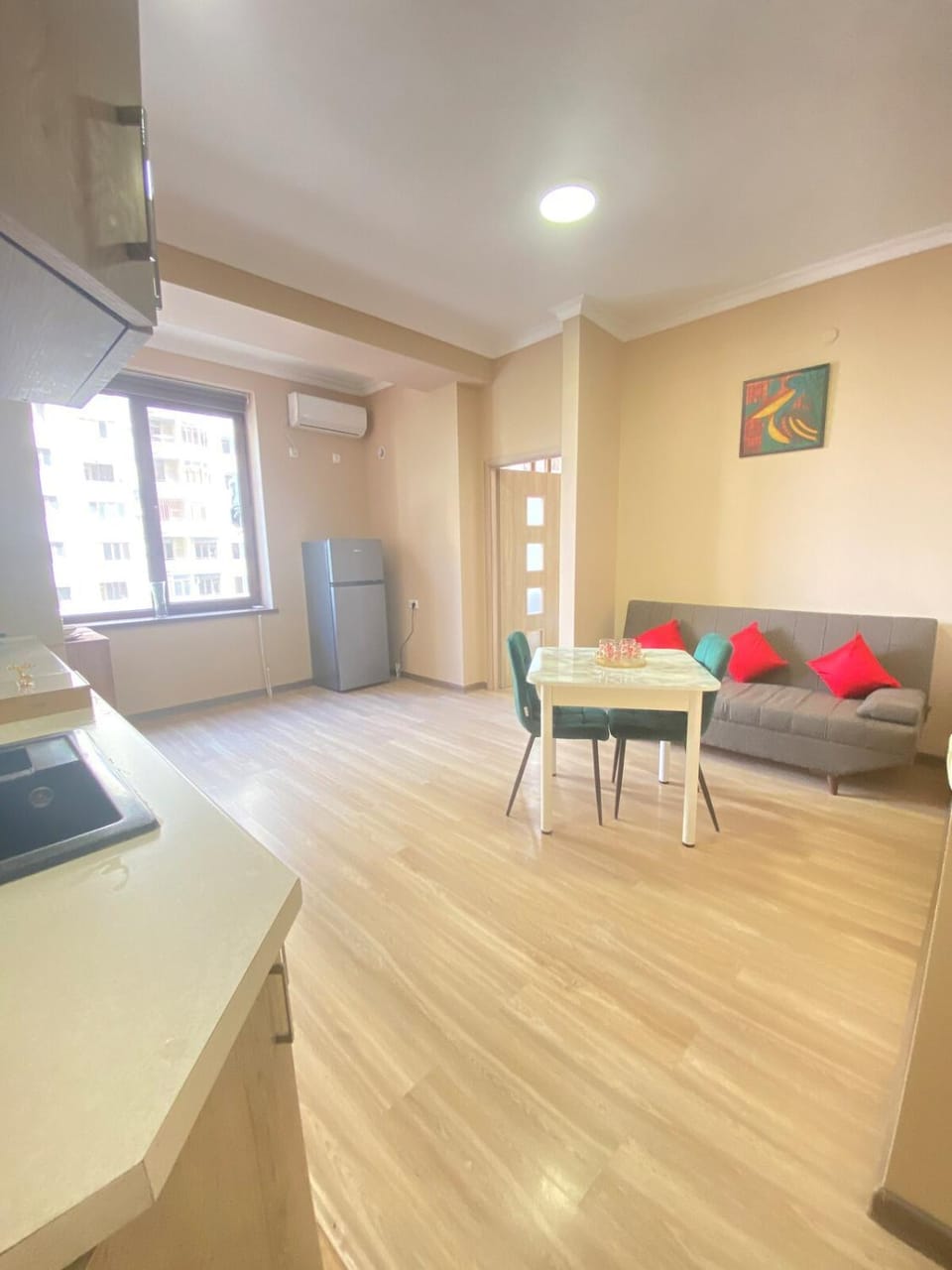 Kitchen or kitchenette, Living room, Seating area, Dining area, air conditioner