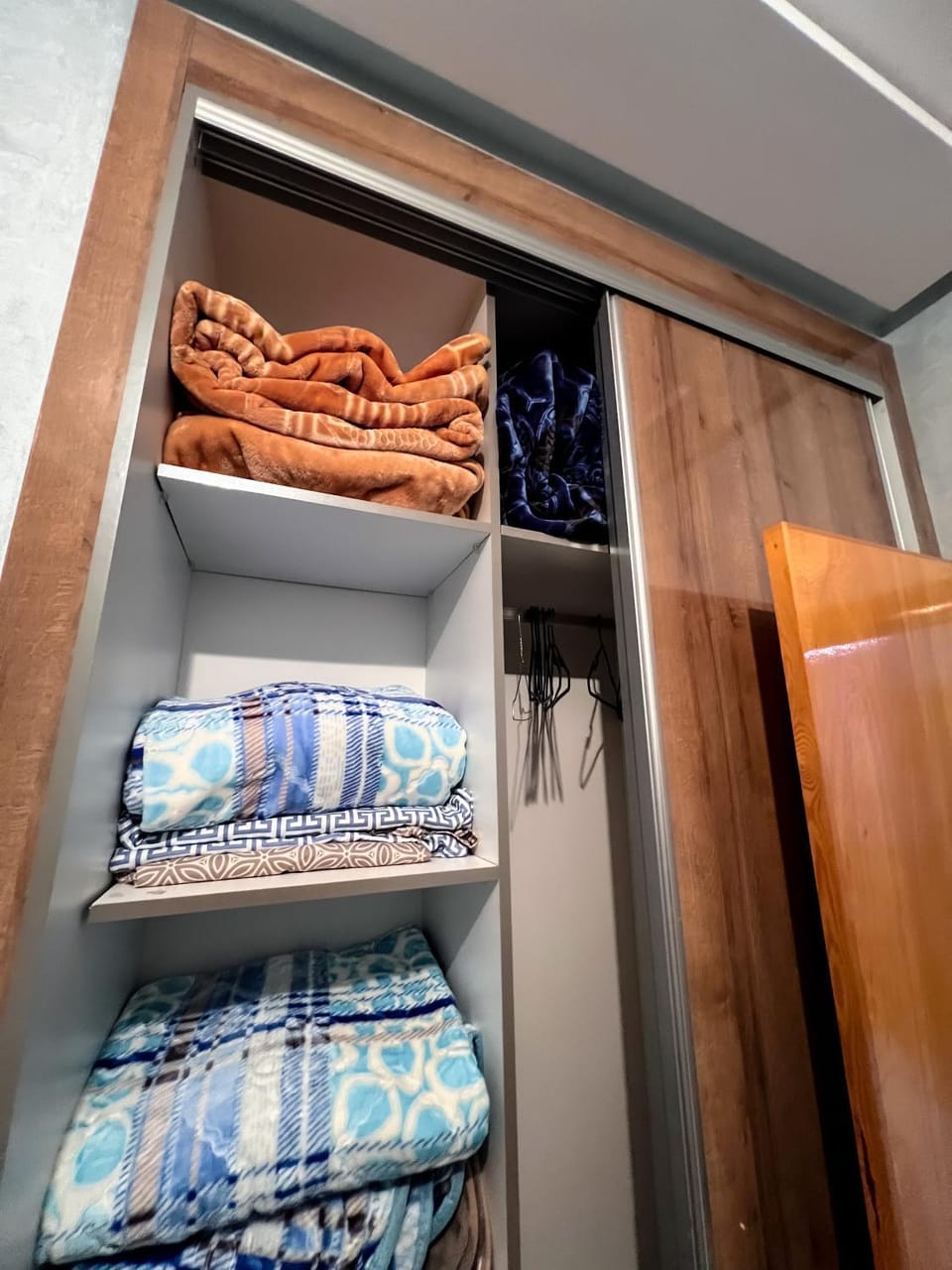 bunk bed, towels, wardrobe