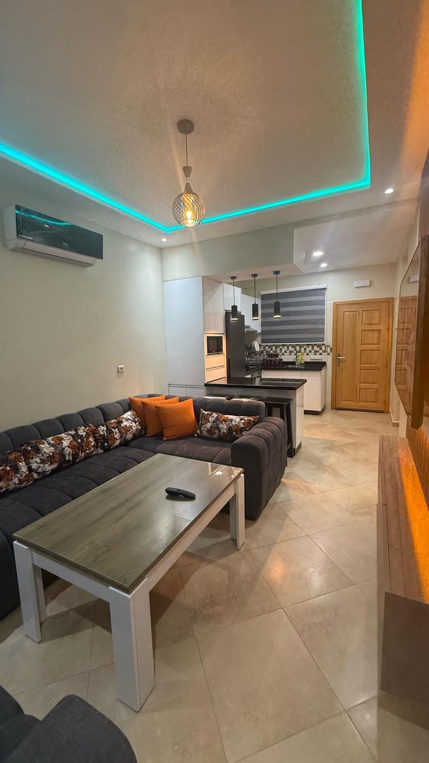 Kitchen or kitchenette, Living room, Photo of the whole room, Seating area, Dining area, oven, stove, air conditioner