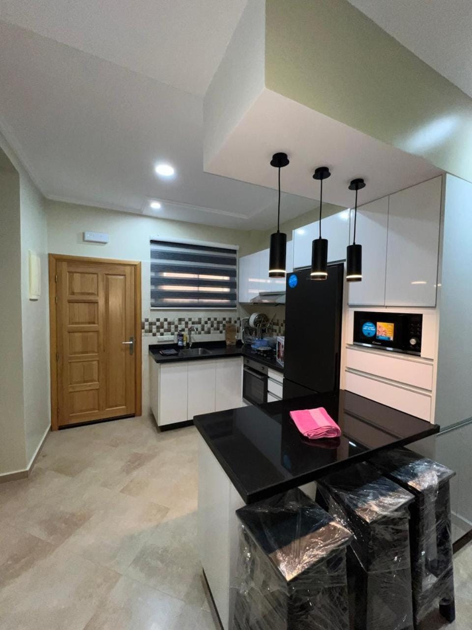 Kitchen or kitchenette, dishwasher, oven, stove, toaster