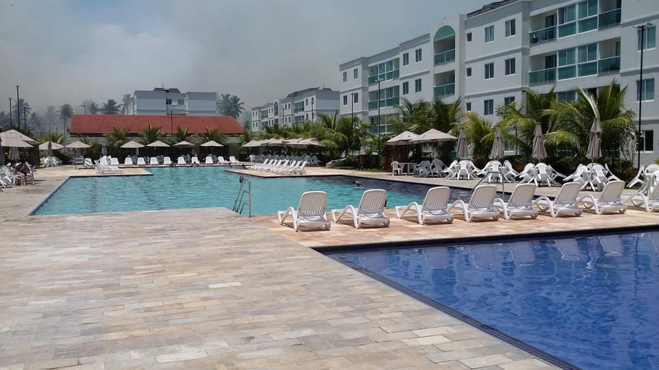 Property building, Day, Pool view, Swimming pool, Swimming pool, sunbed