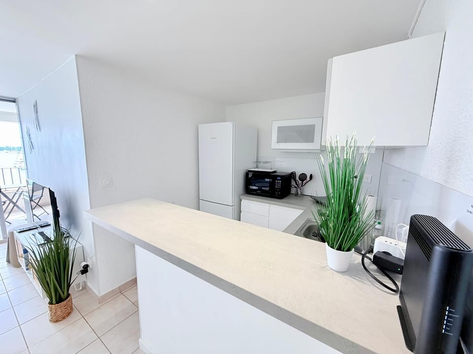 Duplex-HYPER Centre Cap d'Agde - 9 personnes - Vue port et Mer - WIFI Apartment in Agde
