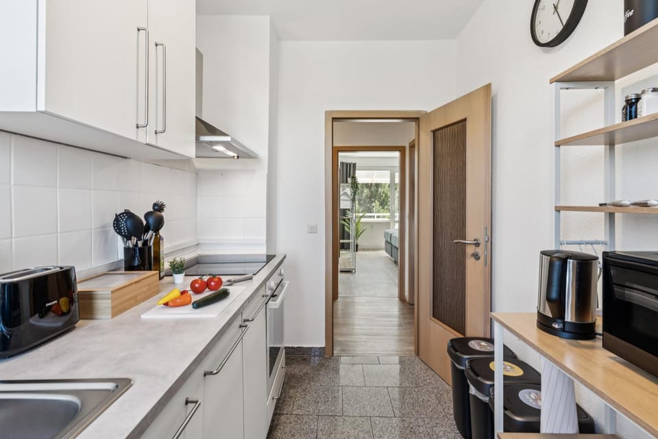 Kitchen or kitchenette, dishwasher, oven, stove, toaster
