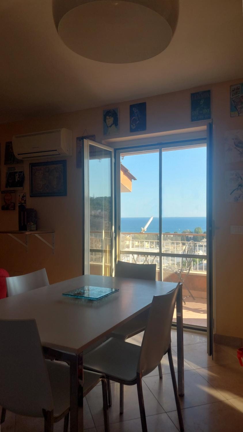 Natural landscape, Living room, Seating area, Dining area, Sea view