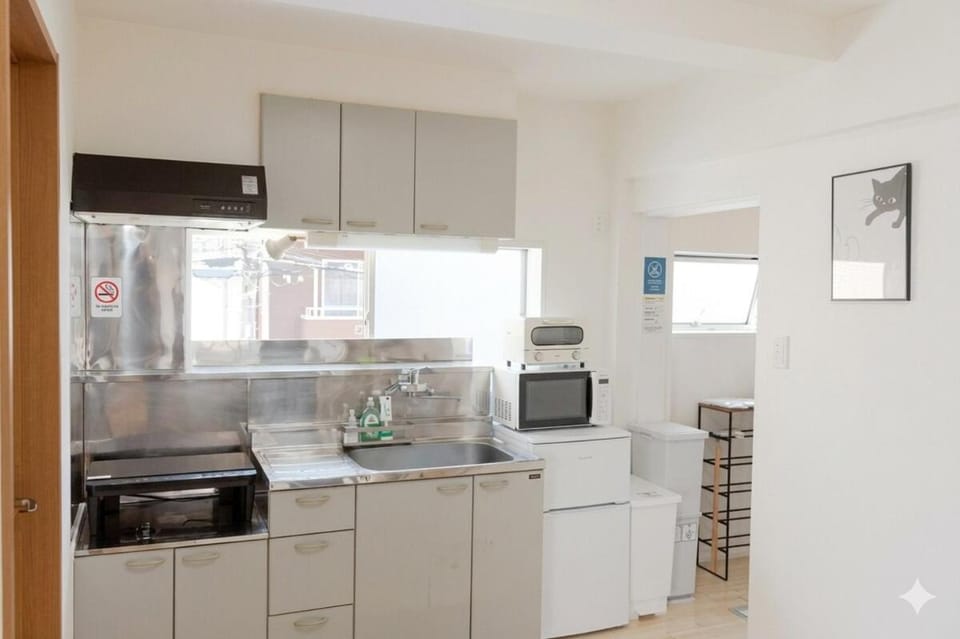 Kitchen or kitchenette, microwave, oven, stove, toaster, kitchen