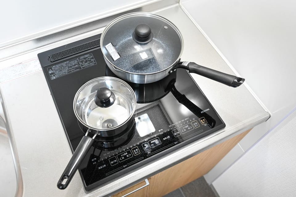 Kitchen or kitchenette, stove