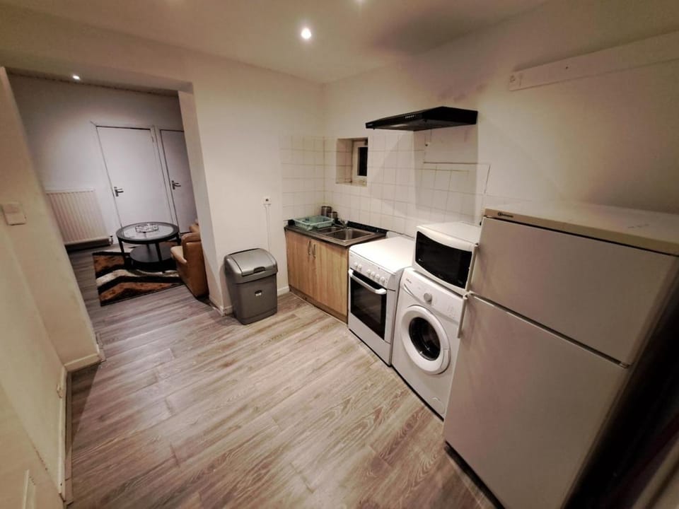 Appartement chambre et salon RDC Apartment in Liège