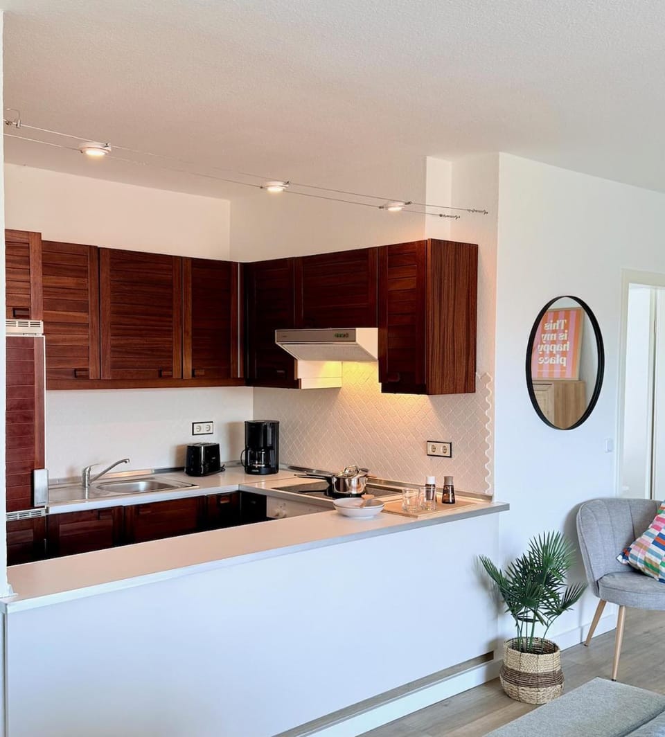 Kitchen or kitchenette, stove, toaster