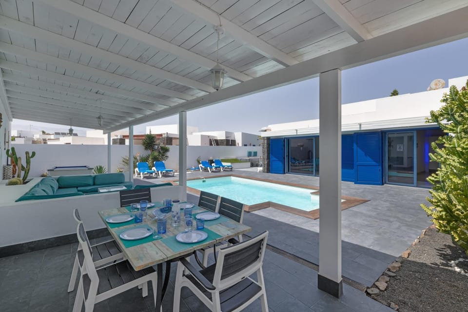 Property building, Living room, Swimming pool
