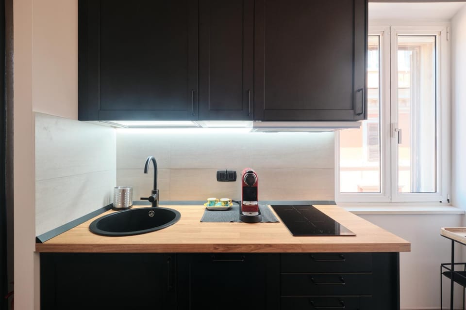 Kitchen or kitchenette, stove