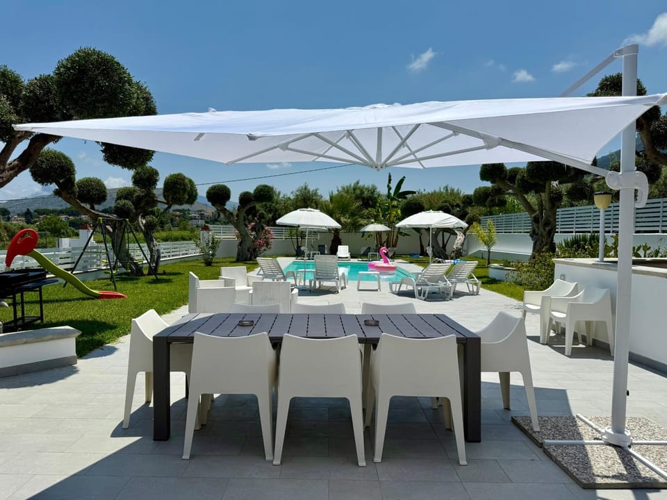 Patio, Spring, Day, Natural landscape, Garden, Dining area, Garden view, Pool view, Swimming pool