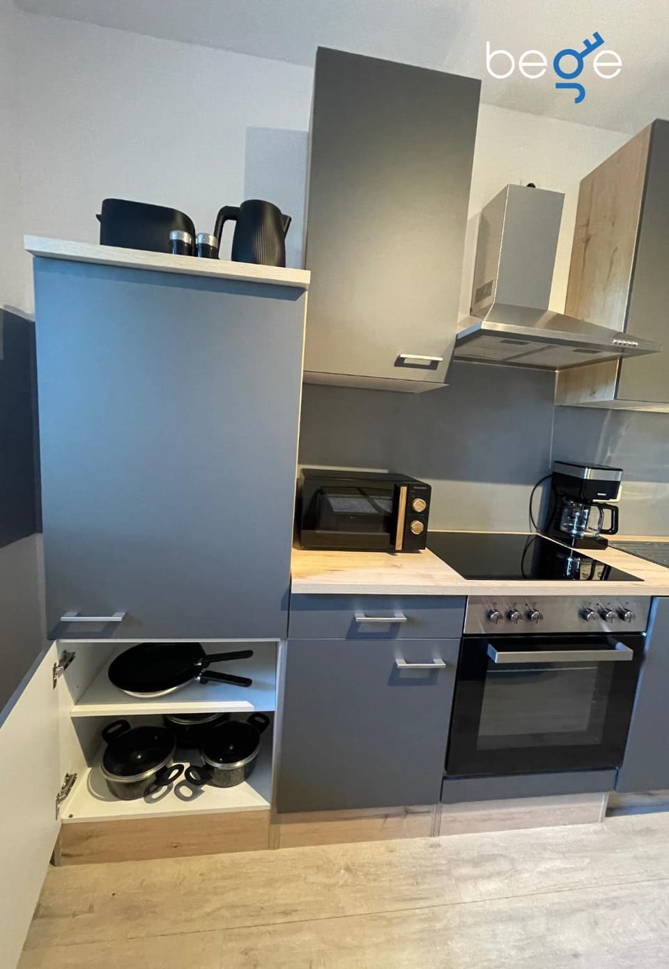 Kitchen or kitchenette, dishwasher, oven, stove, toaster