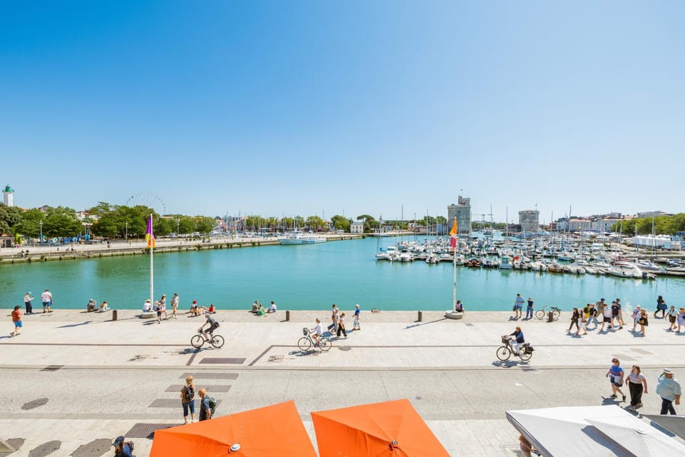 Nearby landmark, Day, Natural landscape, Activities, Beach, City view, Sea view