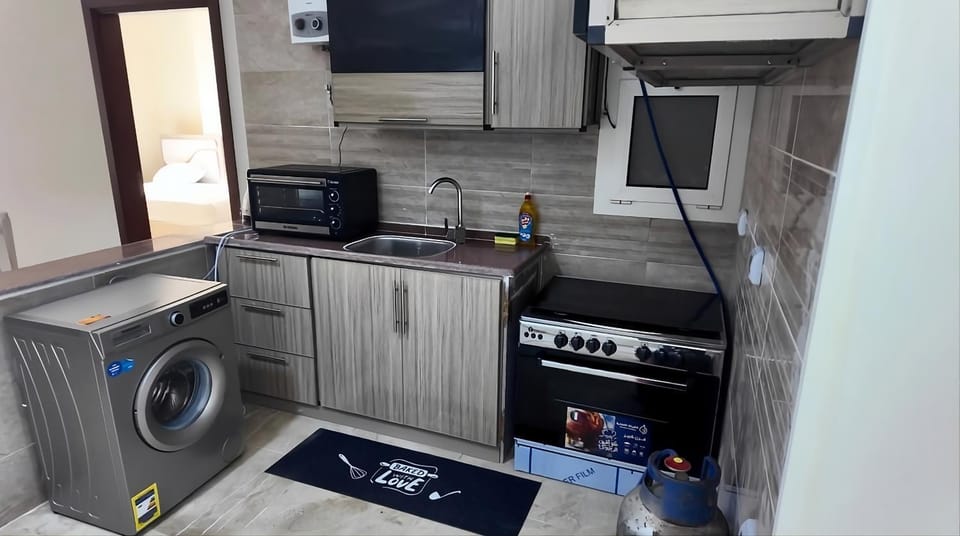 Kitchen or kitchenette, oven, stove