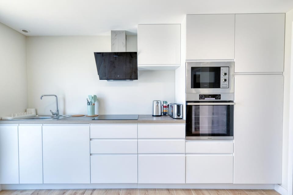 Kitchen or kitchenette, oven, stove, toaster