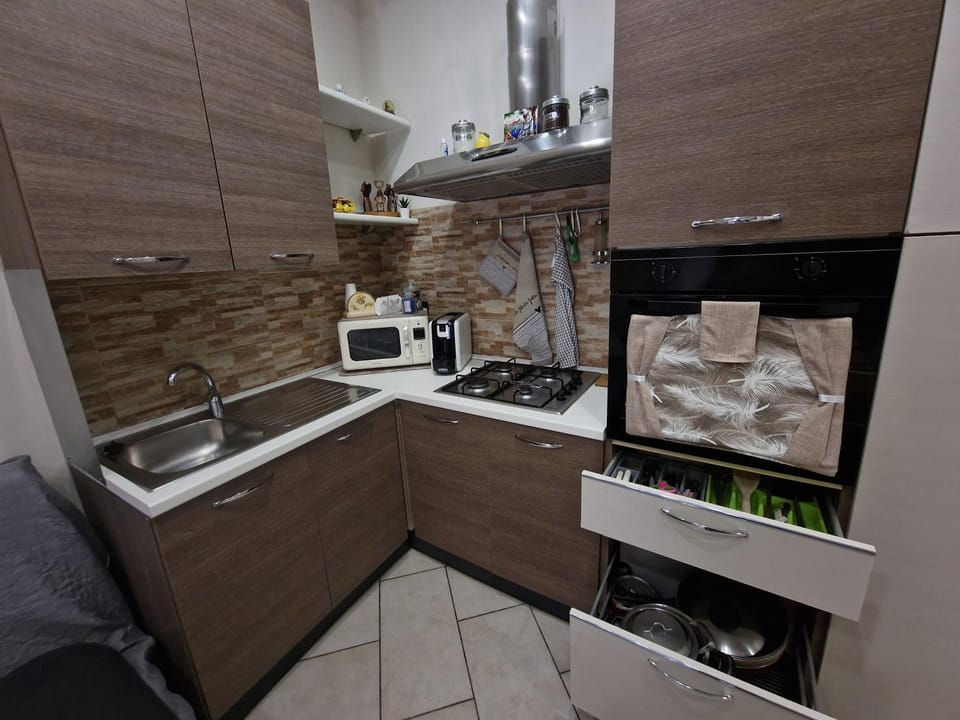Kitchen or kitchenette, stove