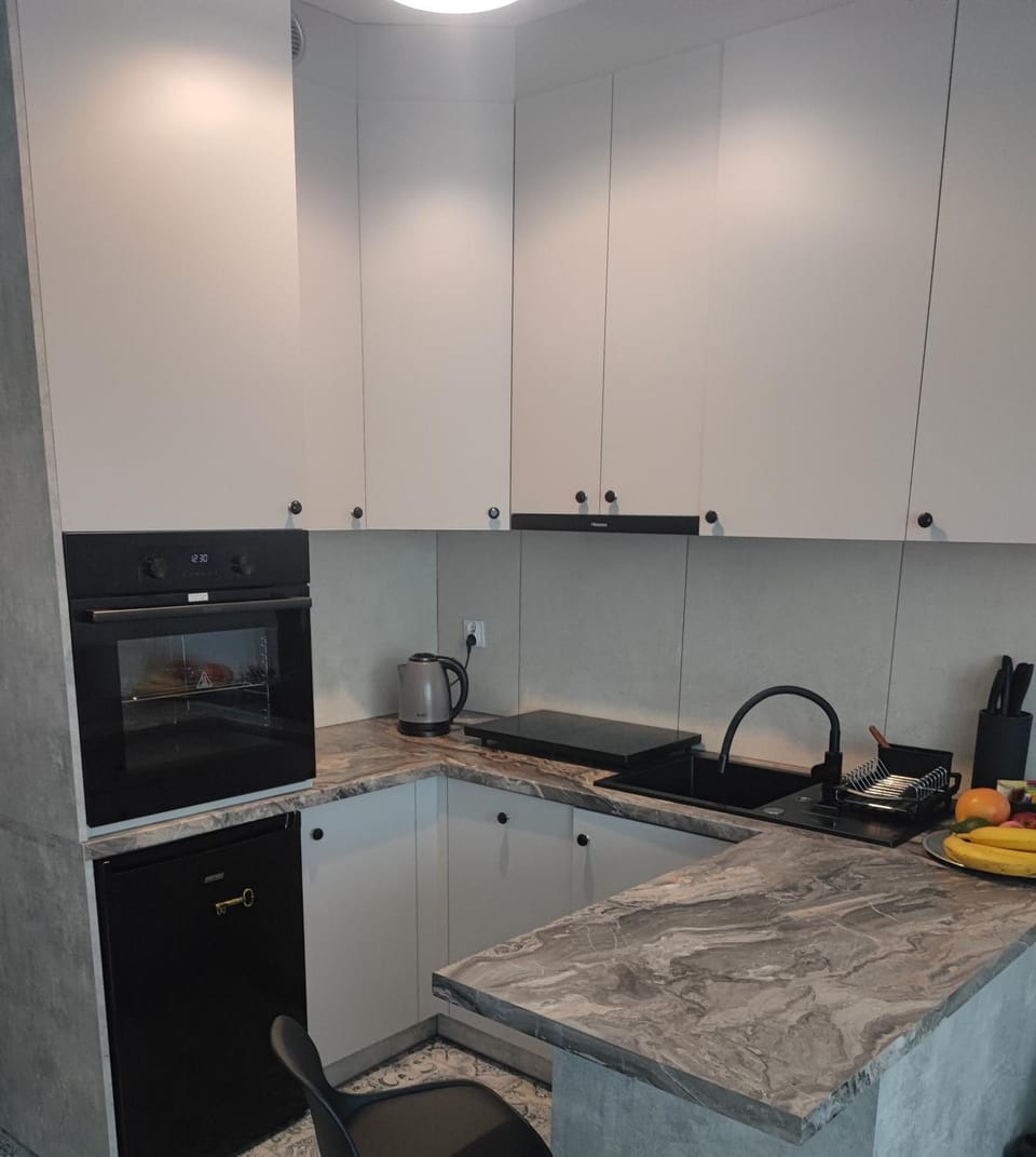 Kitchen or kitchenette, stove