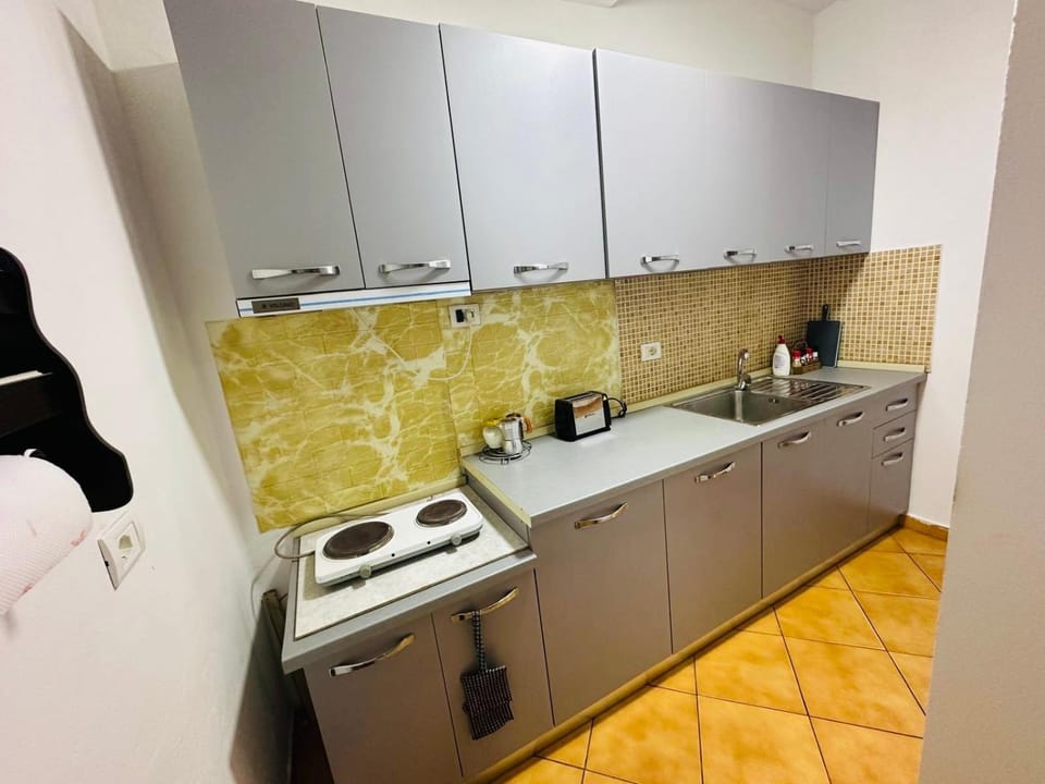 Kitchen or kitchenette, stove