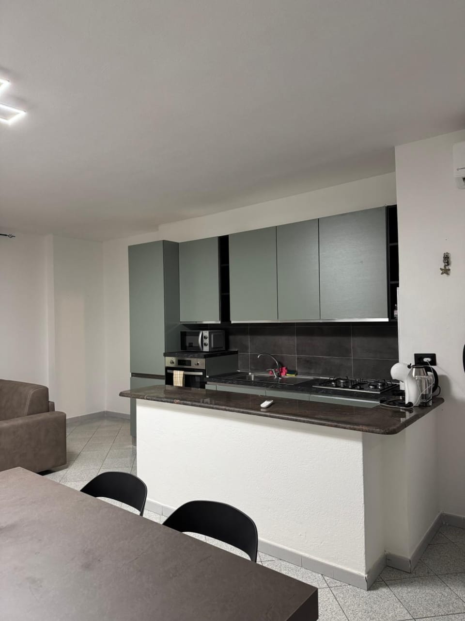 Kitchen or kitchenette, stove