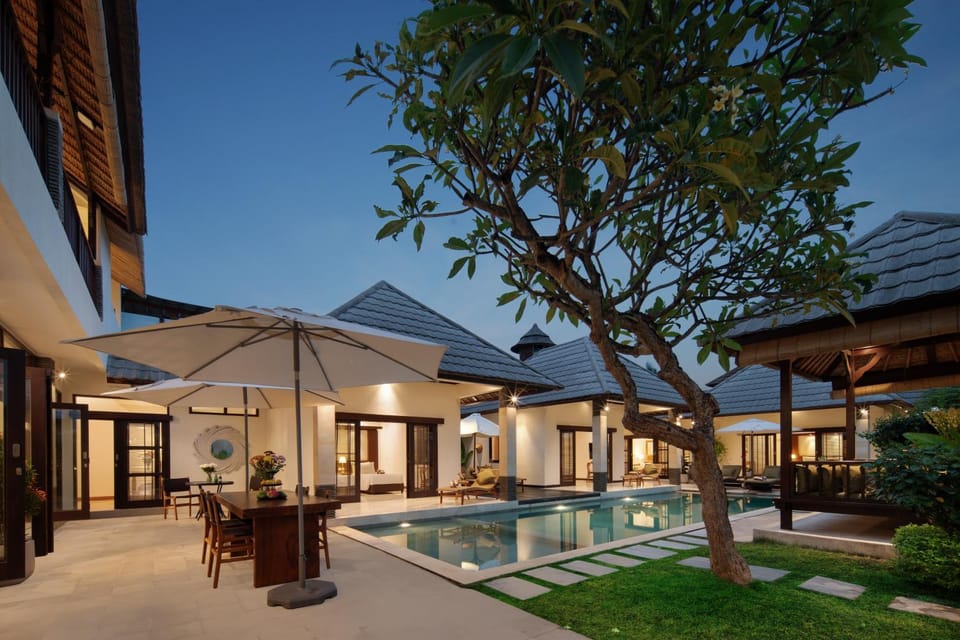 Property building, Patio, Night, Pool view, Swimming pool, sunbed