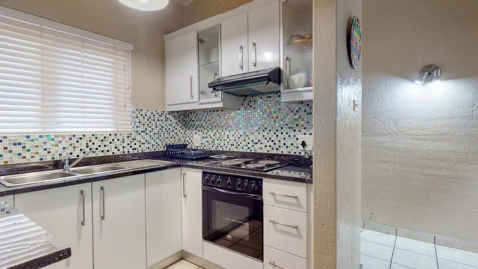 Kitchen or kitchenette, oven, stove