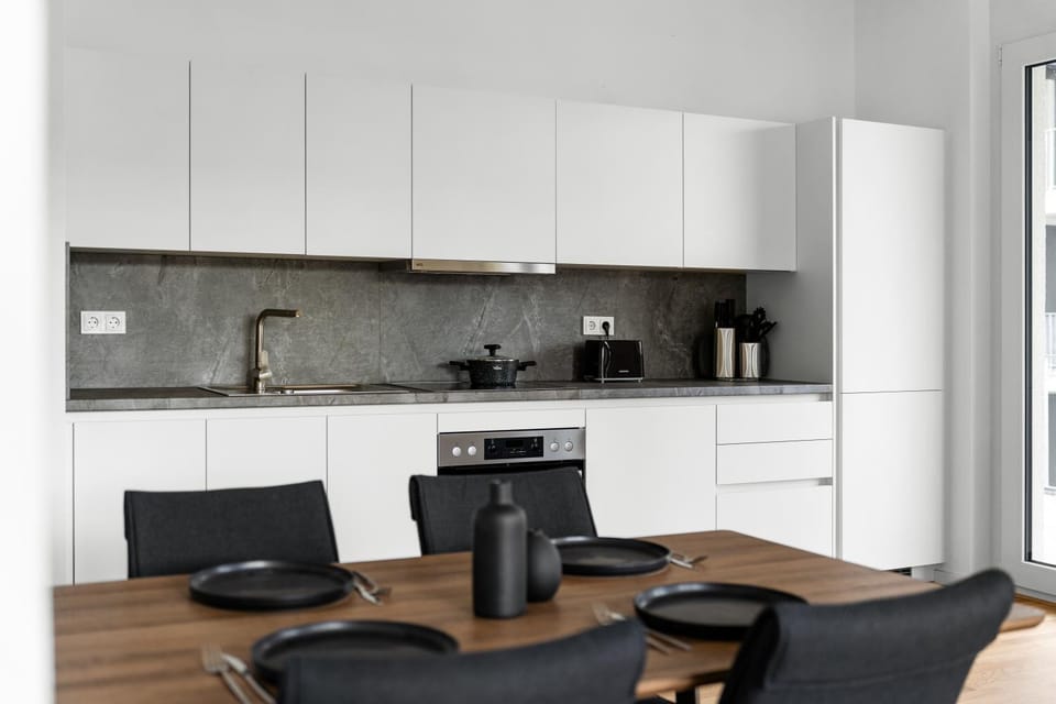 Coffee/tea facilities, Kitchen or kitchenette, Living room, Seating area, Dining area, oven, stove, toaster