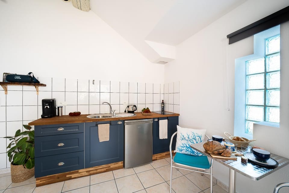 Kitchen or kitchenette, stove