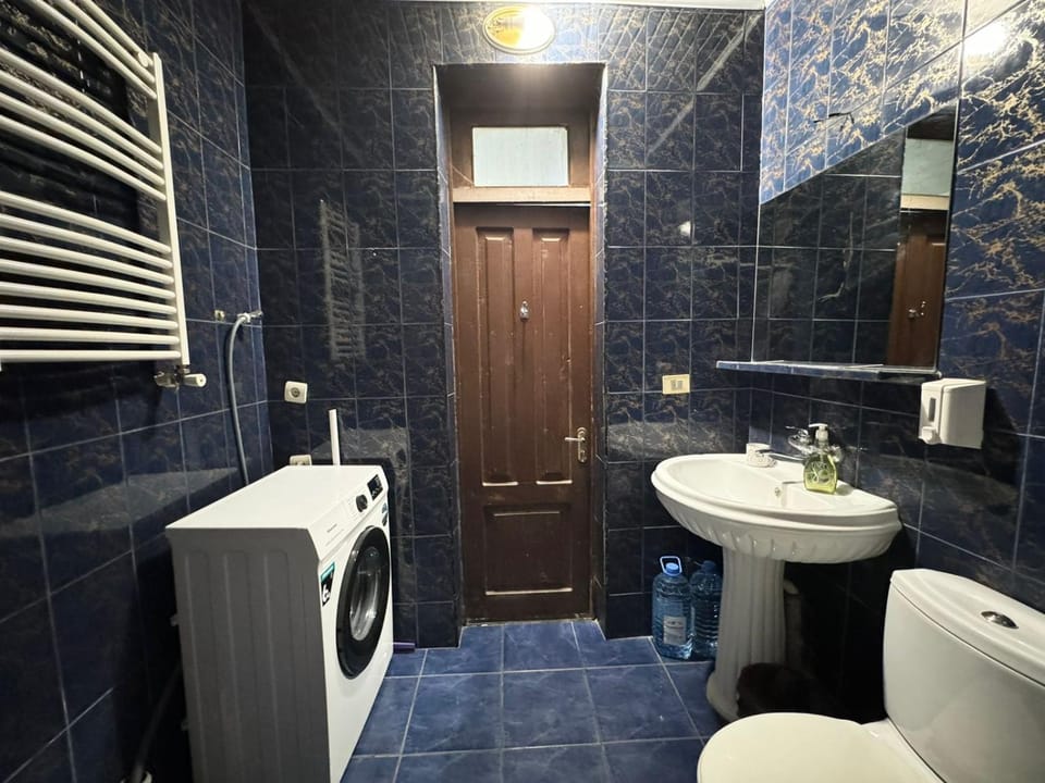 Shower, Toilet, Bathroom, Bath, bidet, towels, washing machine