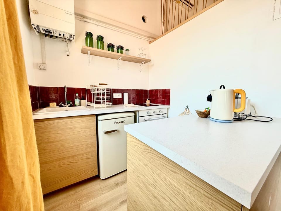 Kitchen or kitchenette, stove, kitchen
