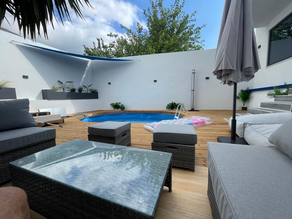 Patio, Seating area, Pool view, Swimming pool, sunbed