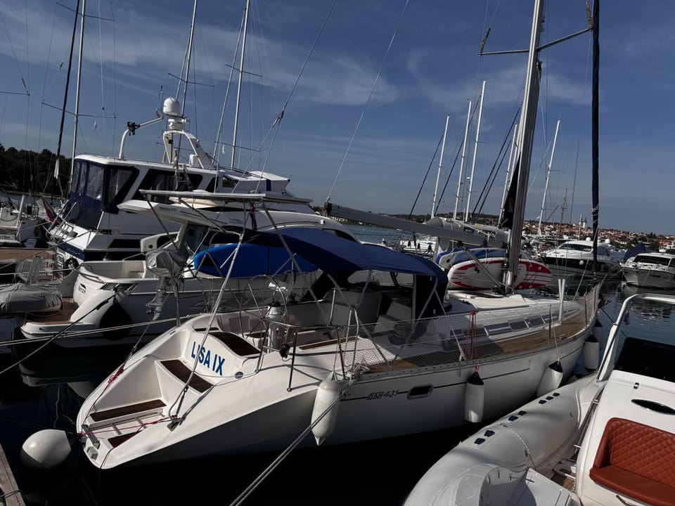 Sailboat on the sea Docked boat in Premantura