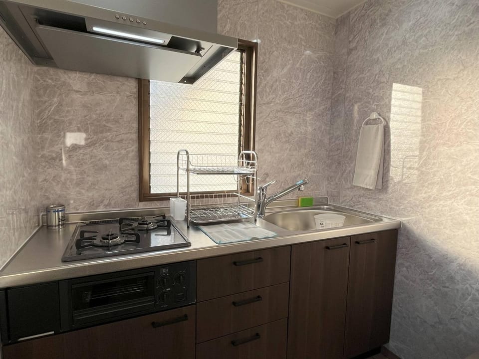 Kitchen or kitchenette, stove