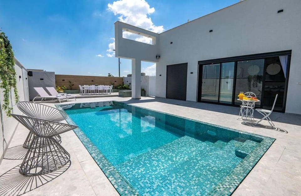 Property building, Patio, Day, Natural landscape, View (from property/room), Balcony/Terrace, Pool view, Swimming pool, sunbed