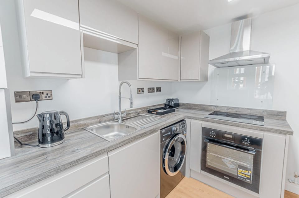 Kitchen or kitchenette, oven, stove, toaster
