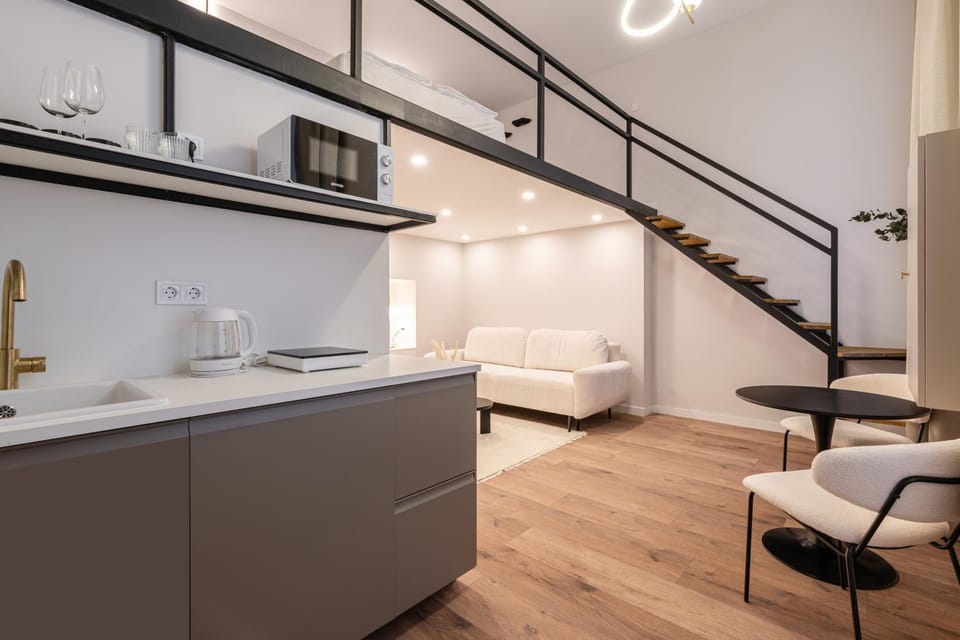 Kitchen or kitchenette, Living room, Seating area, Dining area