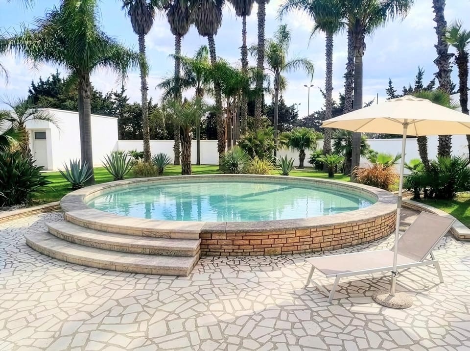 Property building, Living room, Swimming pool