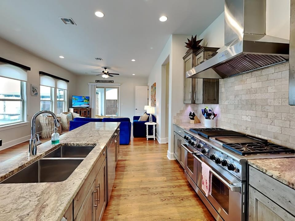 Kitchen or kitchenette, Living room, Seating area, furniture, stove, kitchen