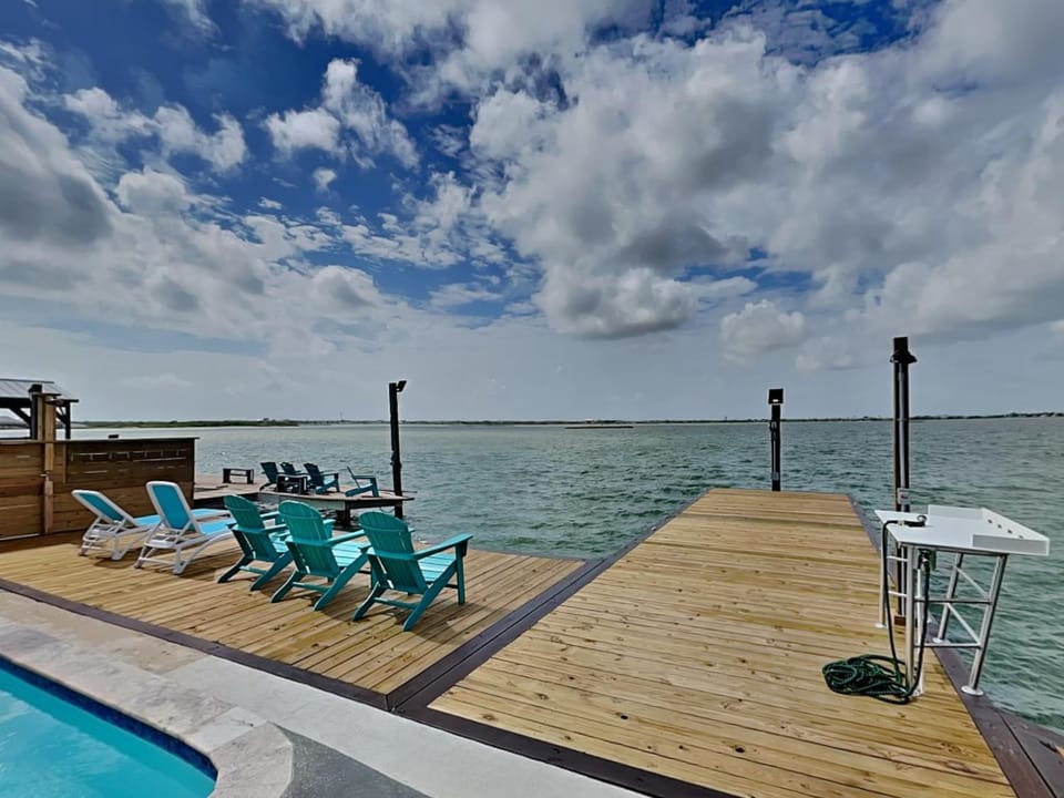 Patio, Seating area, Pool view, Sea view