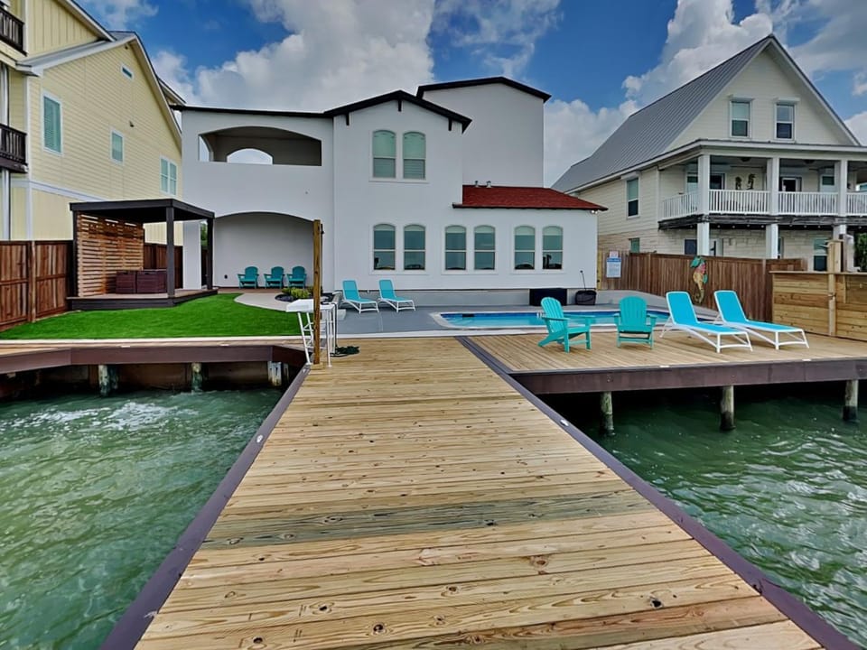 Property building, Patio, Seating area, Swimming pool