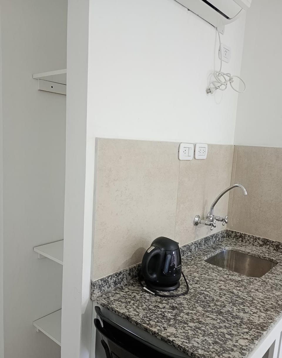 Kitchen or kitchenette, wardrobe, air conditioner