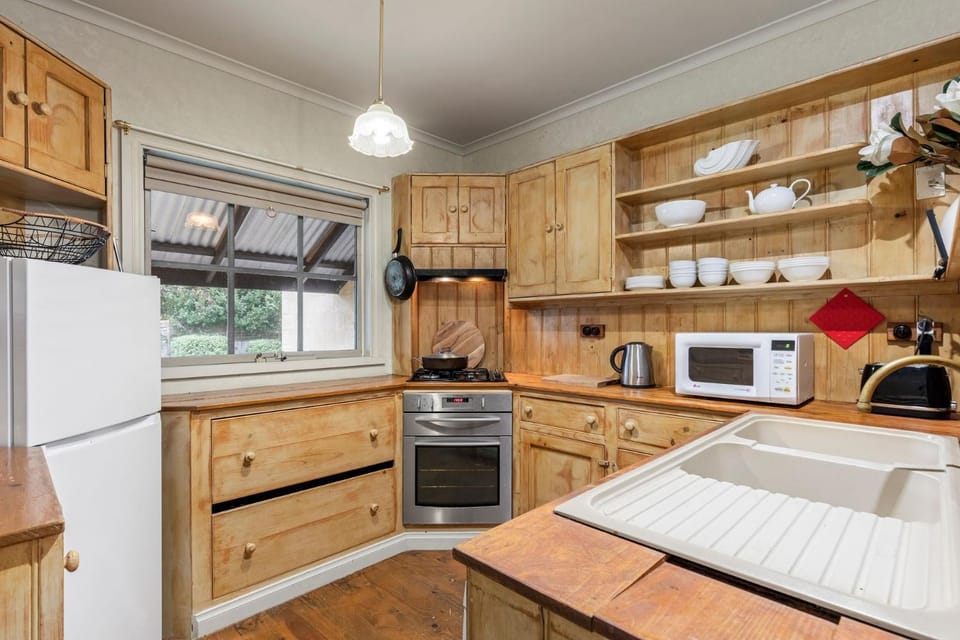 Kitchen or kitchenette, dishwasher, oven, stove, toaster