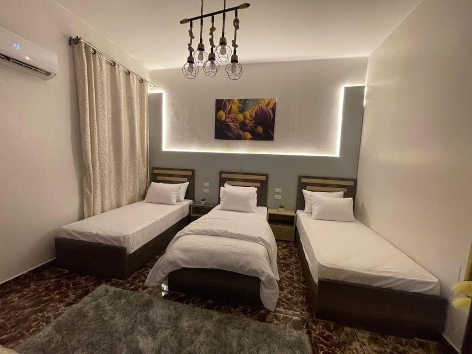 Bed, Photo of the whole room, Bedroom, towels, air conditioner