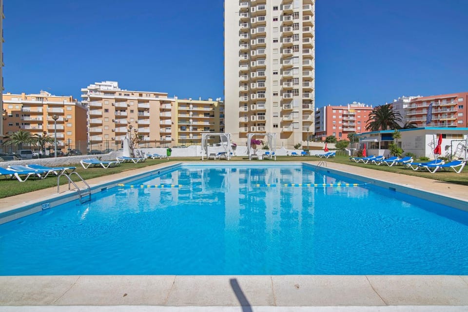 Property building, Living room, Swimming pool