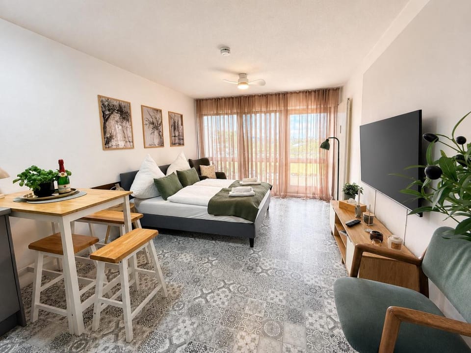 Bed, Living room, Dining area