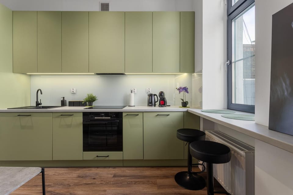 Kitchen or kitchenette, dishwasher, stove, washing machine