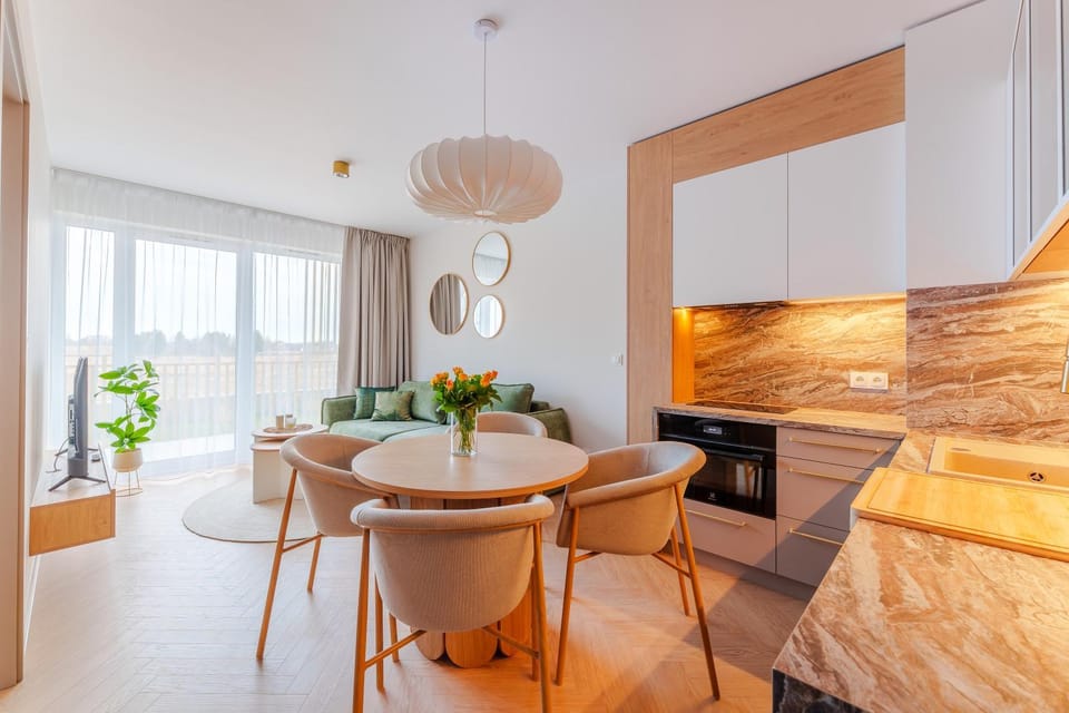 Kitchen or kitchenette, Living room, Seating area, Dining area