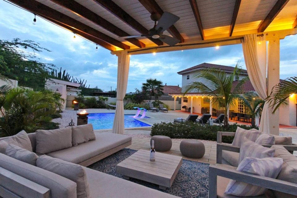 Patio, Natural landscape, Living room, Seating area, Pool view, Swimming pool